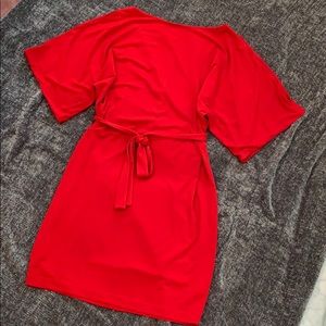 Red dress with slit open arms